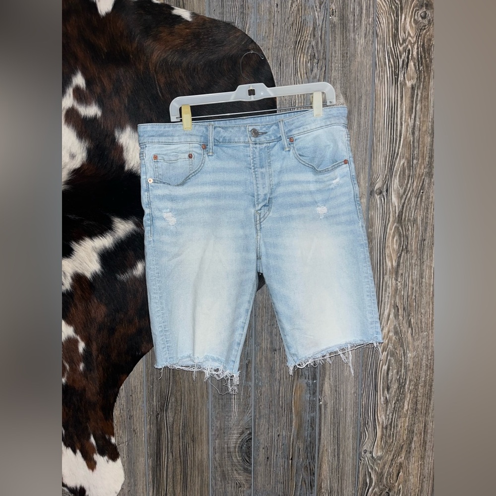 American Eagle Outfitters size 34 lightwash distressed longer jean shorts